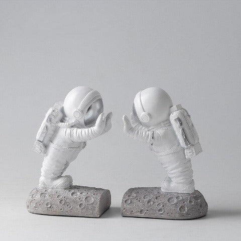 cale livre design astronautes blancs lunaires
