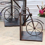 cale livre original en bronze vélo